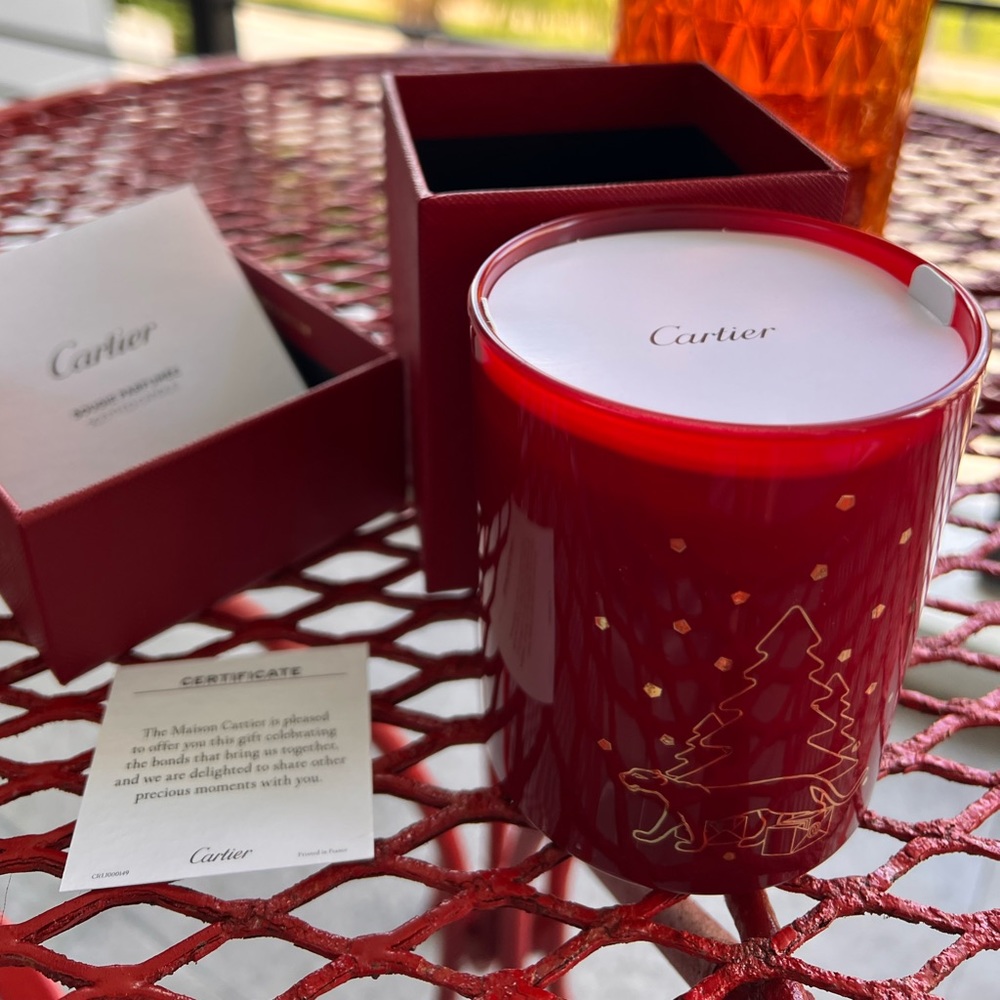 Authentic Cartier 6.5 oz scented candle with a Christmas motive. New.